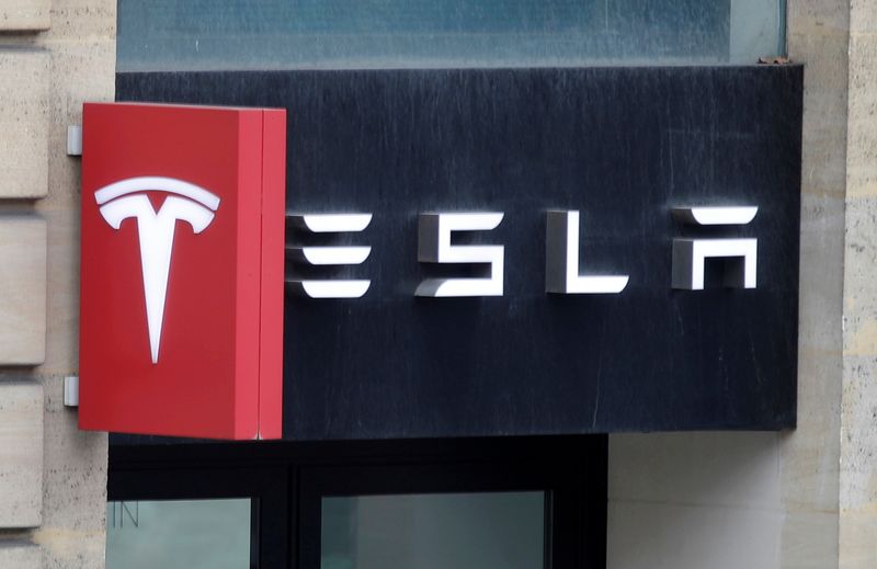 Tesla working to integrate Apple CarPlay in its EVs, Bloomberg News reports