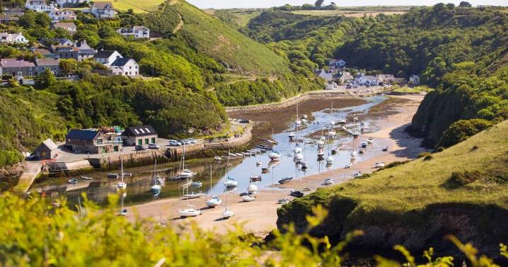 'Perfect' Welsh village with horseshoe harbour and colourful houses