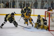 Prep hockey roundup: Spartans put up eight; Moorhead blitzes Roseau