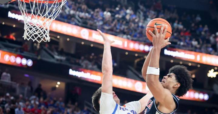 Freshman Koa Peat leads No. 13 Arizona to 93-87 win over defending champion, No. 3 Florida