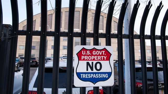 Suspect in shooting of National Guard members faces first