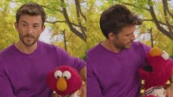 Jonathan Bailey's sweet exchange with Elmo wins the internet. Watch