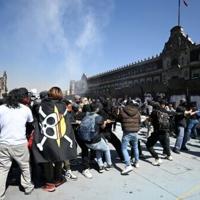 Clashes erupt in Mexico City anti-crime protests, injuring 120