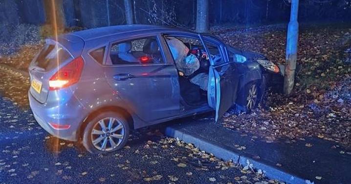 Stolen car smashed into lamp post after police chase through north Manchester