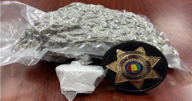 Harvest man wanted for DUI caught with cocaine, charged with drug trafficking