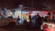 Fire crews respond to a house fire on Avenue A in Baton Rouge