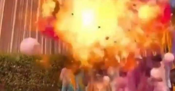 Wedding descends into chaos after balloons suddenly EXPLODE during ceremony