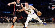 Lakers beat Heat 130-120 behind Doncic's triple