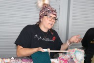 Warming up at holiday craft show at Sault museum