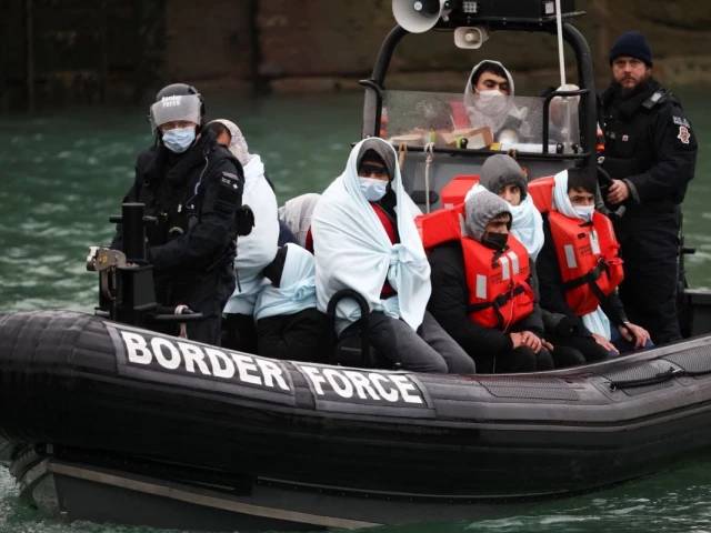 Britain to make refugee status temporary under asylum overhaul