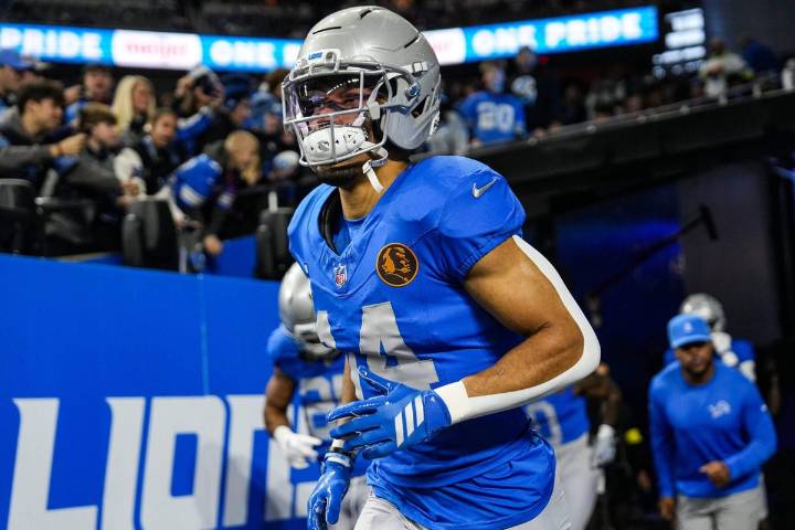 Lions receiver Amon-Ra St. Brown exits with ankle injury vs. Packers, questionable to return