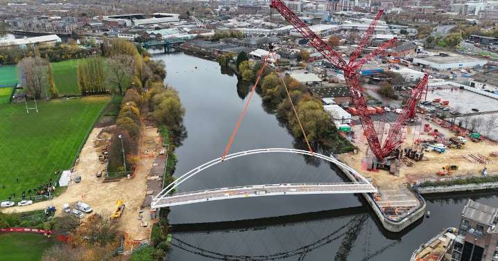Bridge over River Trent lifted into place by Europe's biggest crane