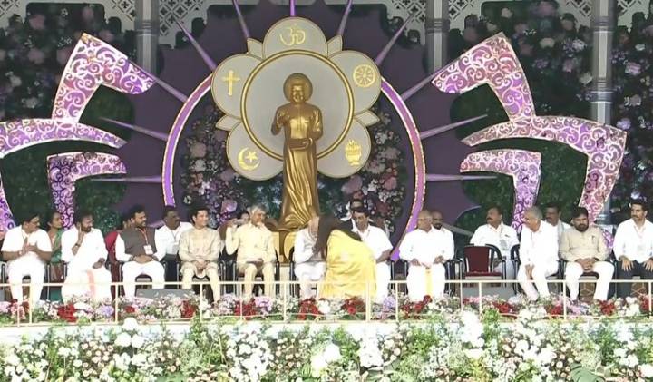 Aishwarya Rai touches PM Modi’s feet at Sri Satya Sai Baba’s centenary celebrations in Andhra