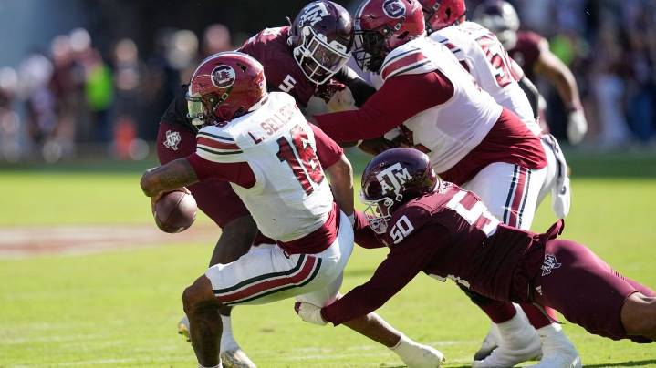 The Latest: Georgia climbs to No. 4, Oklahoma returns to the top 10 of the AP Top 25