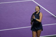 Anisimova beats Swiatek to join Rybakina in last four at WTA Finals