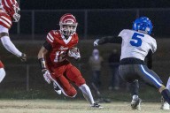 Burton runs for 6 TDs to lead Tigers’ victory