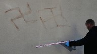 Dozens of swastikas painted in human blood daubed on property across German city