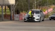 Man clings to car bonnet during Sydney road rage incident