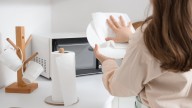 The Simple Dollar Tree Hack That Keeps Paper Towels Off Your Kitchen Counter