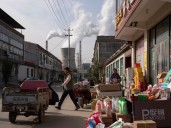 China’s emissions to peak later than previously forecast, experts say