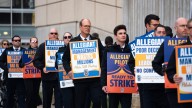 Allegiant pilots picket outside Des Moines International Airport