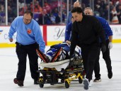 Maple Leaf Chris Tanev stretchered off the ice after hit