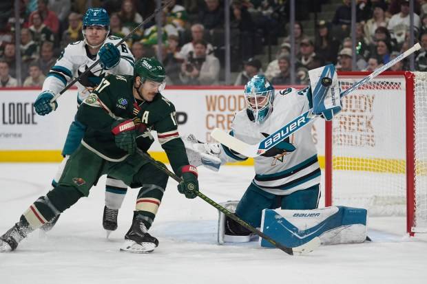Wild dominate early, but Sharks rally for 2