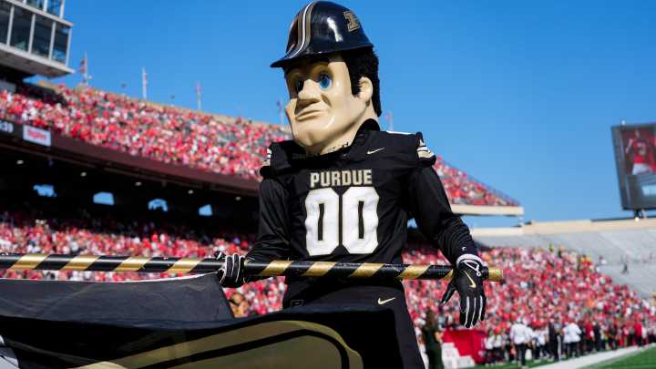 What is the spread for Purdue football at Michigan?