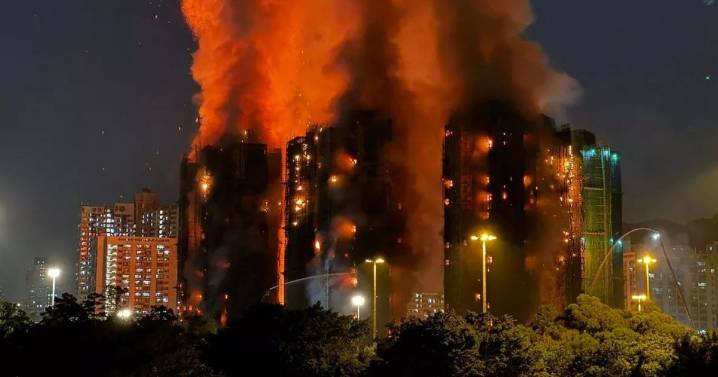 Hong Kong fire deaths rise to 55 as hundreds flee apartment blocks