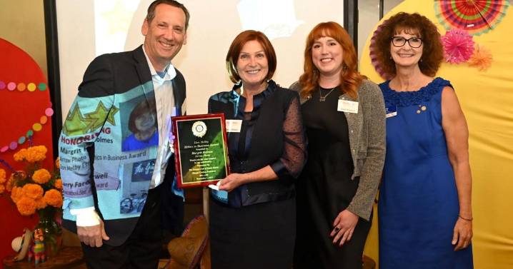 Arrow Photo owner Margrit Holmes, 'peacebuilder' Larry Farewell honored at Rotary event