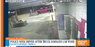Police seek driver after truck damaged car wash