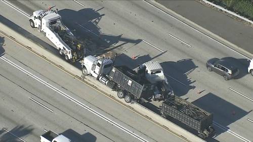 Crash involving semitruck temporarily shuts down several lanes of 405 Freeway in Carson