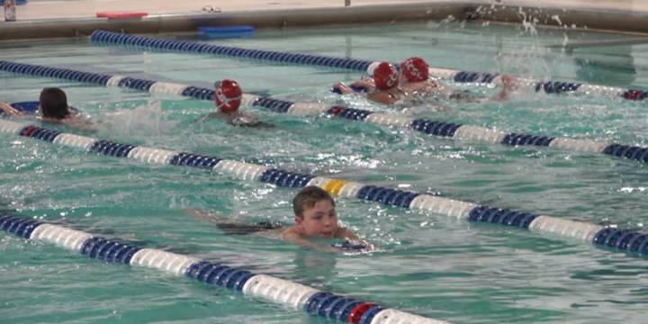Local team swims around the clock for 24-hour relay fundraiser