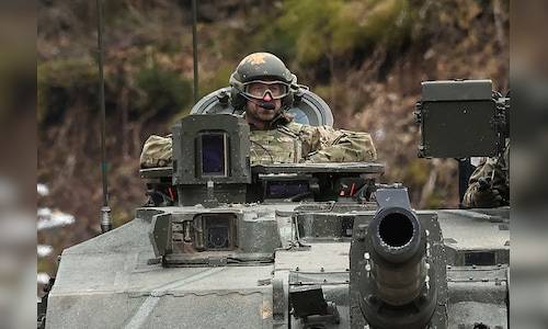 UK issues warning to Russian spy ship on edge of its waters, unveils munitions plan