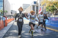 Record crowd trots through downtown Los Angeles to support homeless services