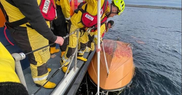 Man found clinging to capsized boat by his "fingertips" off Scottish coast