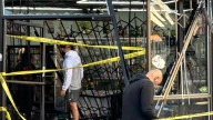 Car driven into Tempe business during break