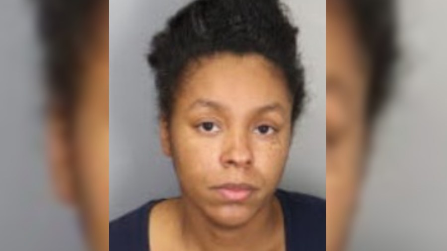 Woman accused of stomping toddler to death, burning genitals