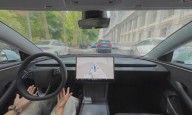 Tesla says texting and driving capability is coming ‘in a month or two’