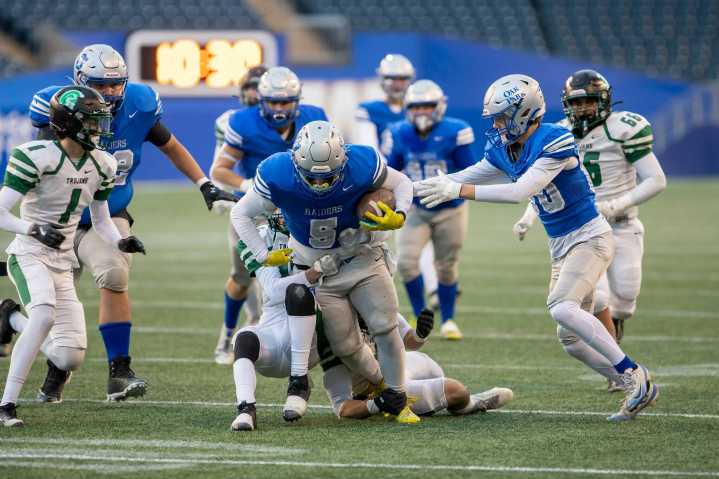 Raiders dominate Trojans on gridiron