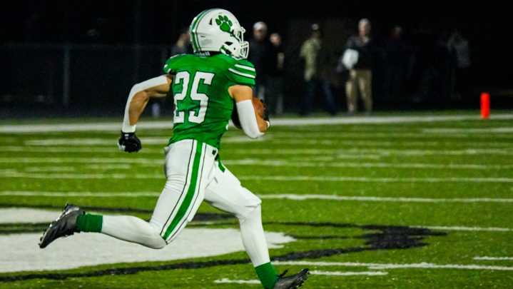 Proud East Canton football coach tips cap to Mogadore and its super back