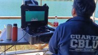 Con robots submarinos y buzos buscan en un lago de Chile al cuidador de la casona de Máxima