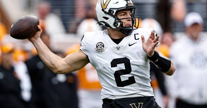 Pavia passes, runs for TDs as No. 12 Vanderbilt beats in-state rival No. 18 Tennessee 45