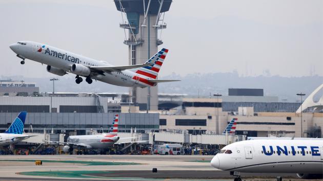 Flight reductions and delays could last another week, officials say
