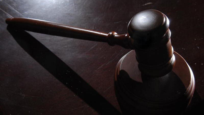 Man who killed Lansing resident while free on bond sentenced