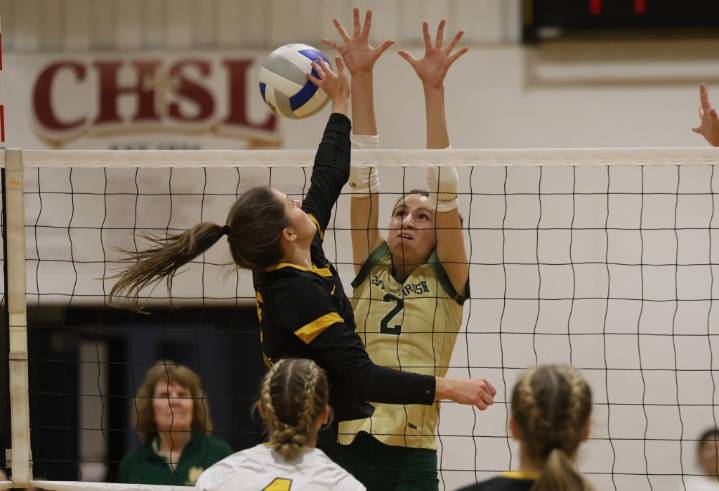 Photos of Macomb Lutheran North vs. Pontiac Notre Dame Prep in D2 volleyball district championship action