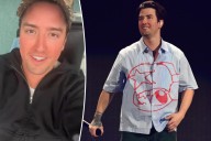 Pop star hospitalized after slicing knee open on stage