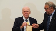 James Watson helped crack DNA's code, sparking medical advances and ethical debates