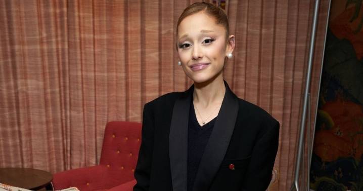 Ariana Grande Wears Nothing but Sheer Tights Under Thom Browne Shirt