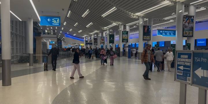 Travelers brace for crowds at the Charlotte airport for Thanksgiving holiday
